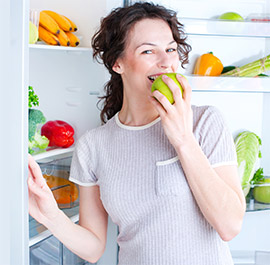 Eating Fruit from Refrigerator